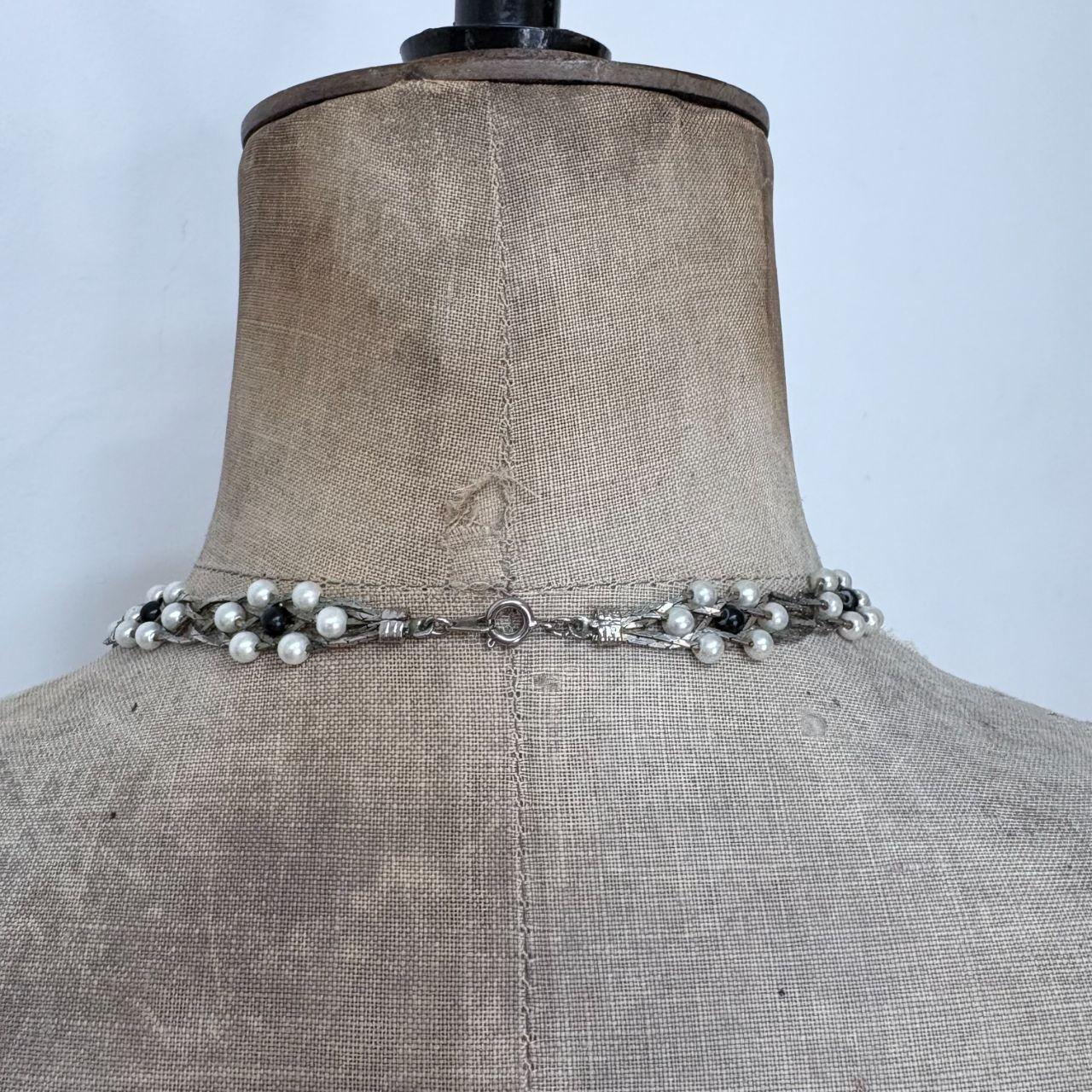 Silver woven pearl necklace