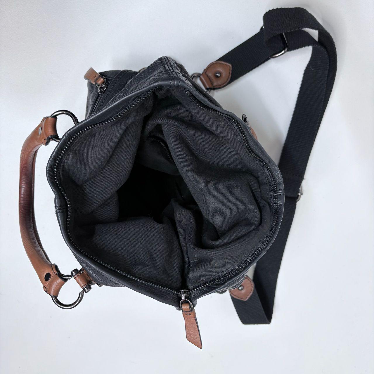 Black buckle leather bag