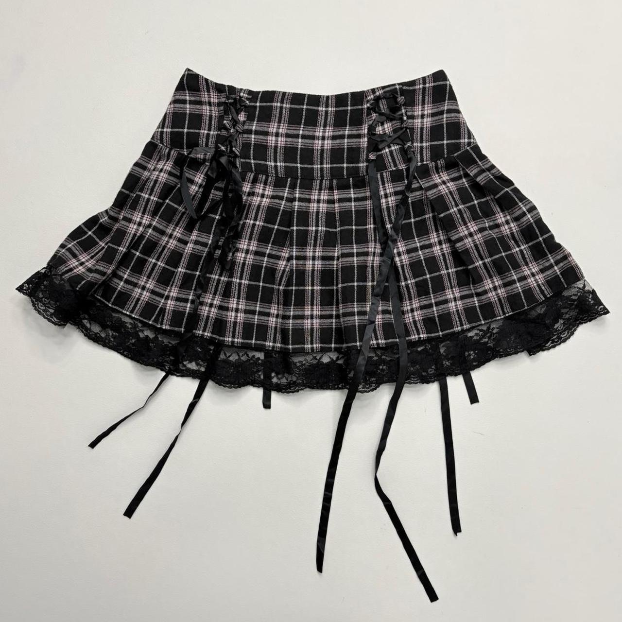 Black pleated mini tartan skirt