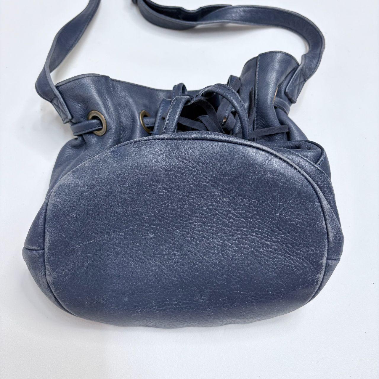 Navy blue tassle bucket bag