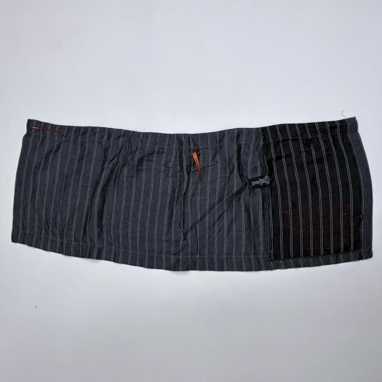 Asymmetric pinstripe cop copine mini skirt