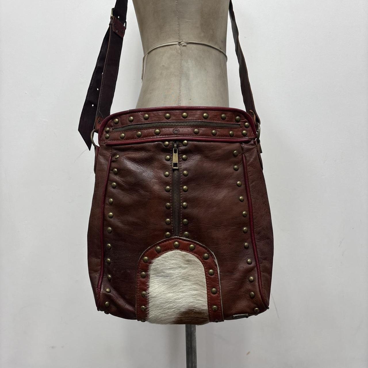 Cow hide studded brown leather bag