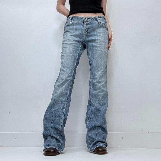 Distressed flared leg low rise jeans