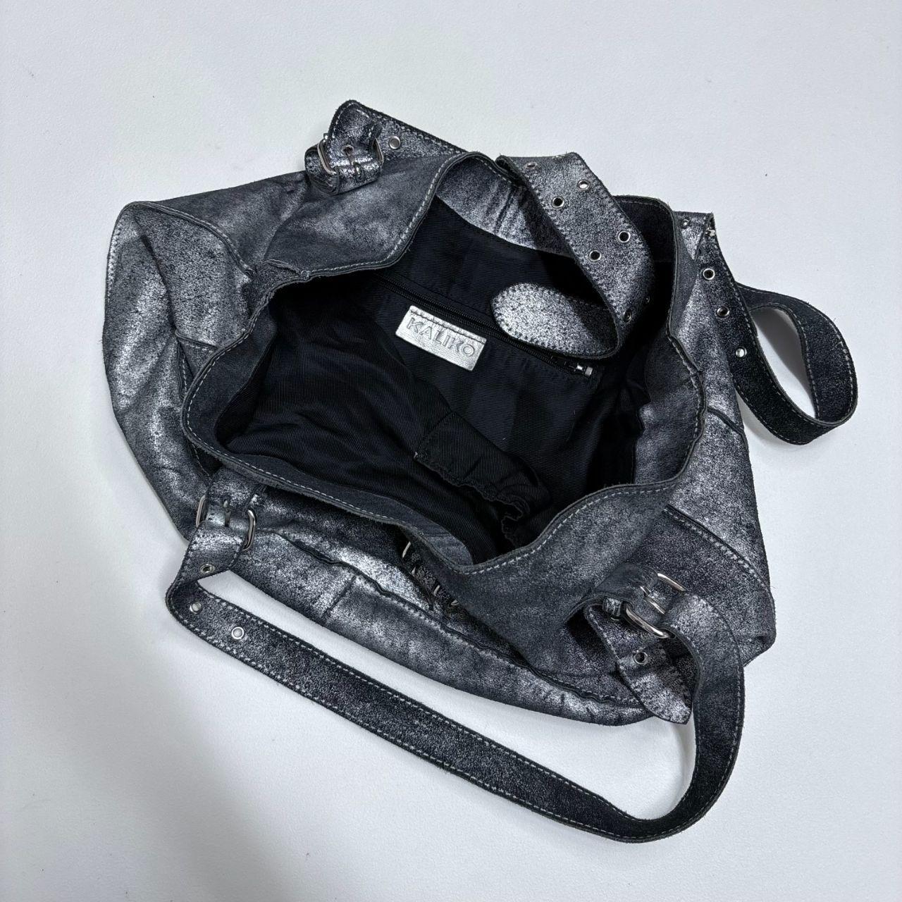 Distressed soft leather cargo buckle handbag