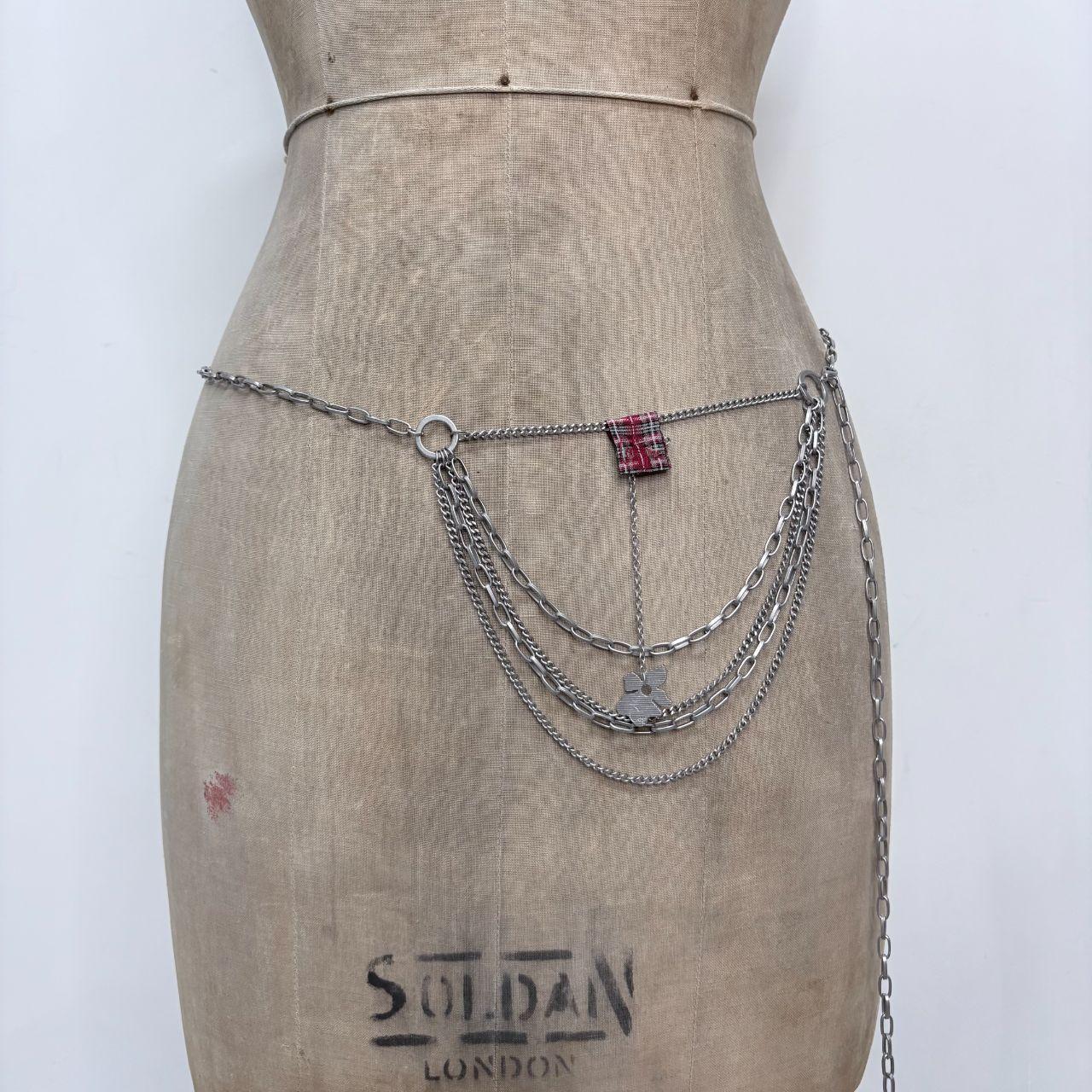 Silver draped cop copine waist chain