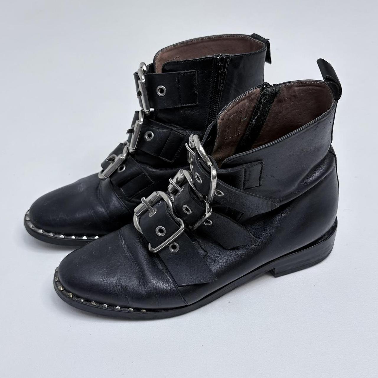 Black leather studded buckle boots