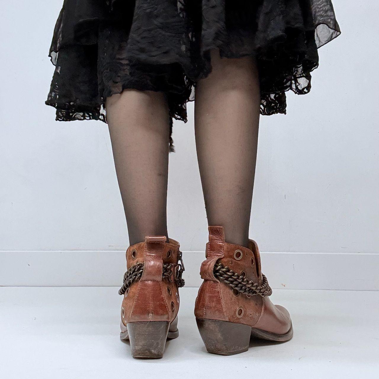 Brown leather studded buckle boots