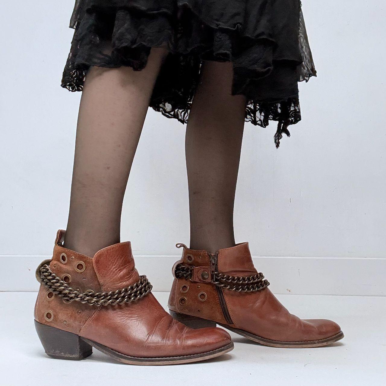 Brown leather studded buckle boots