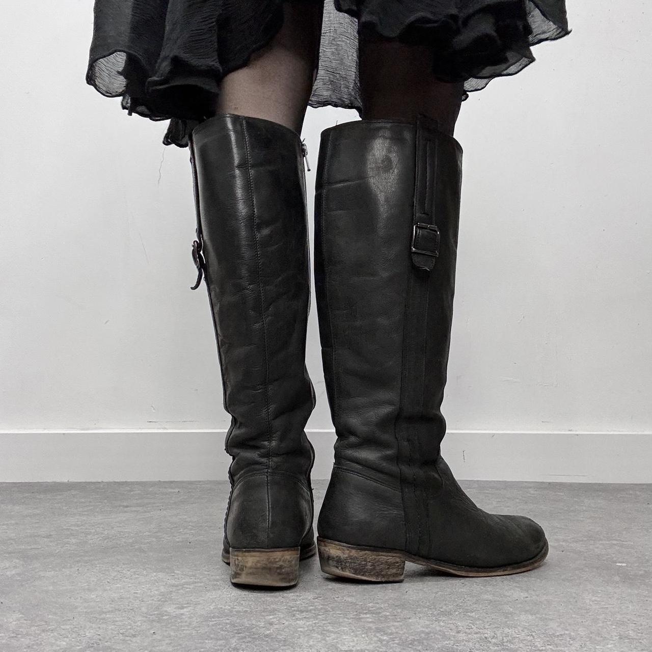 Black leather knee high boots