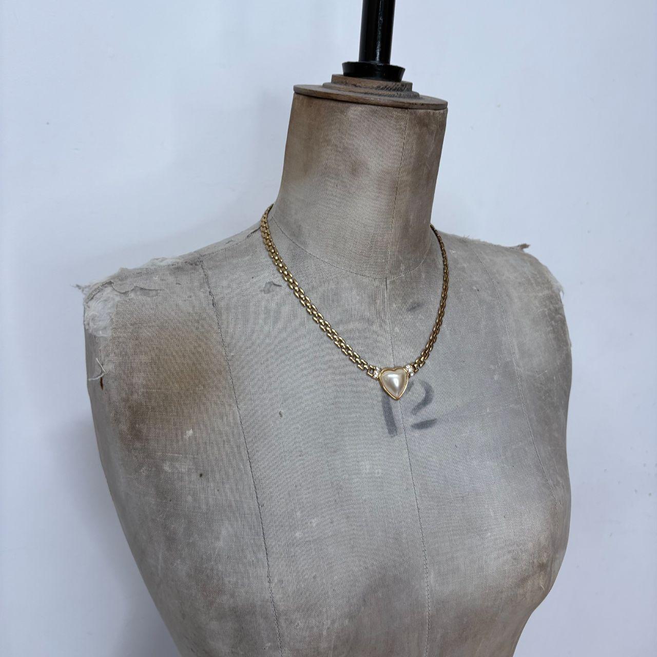Gold tone chain heart necklace