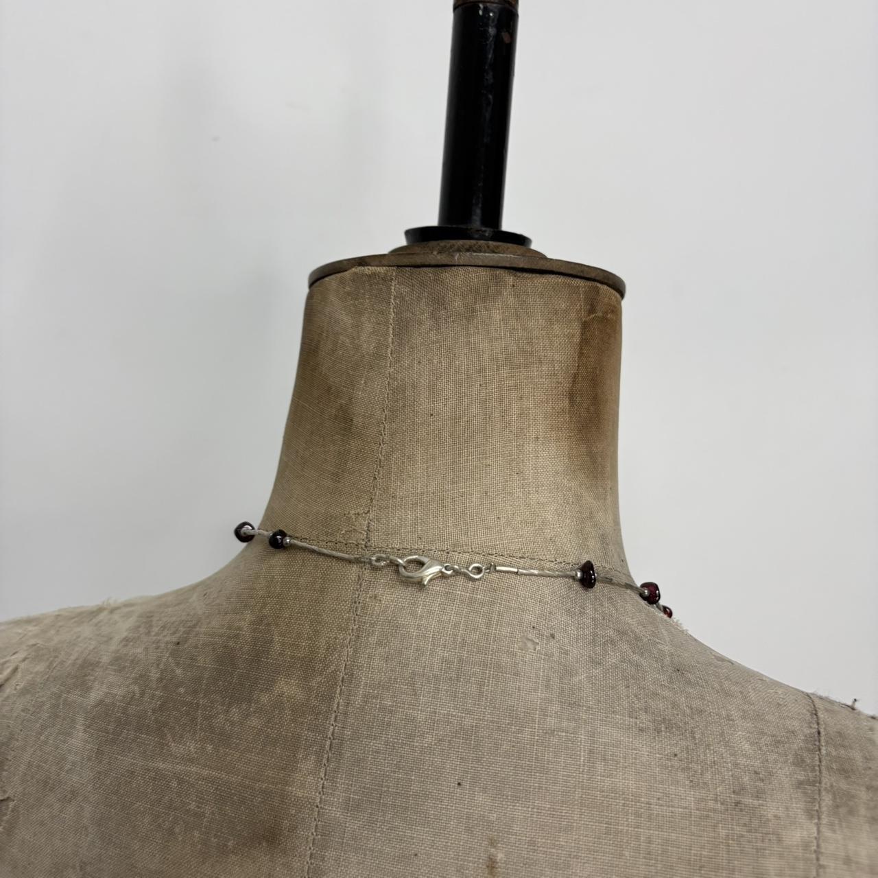 Silver bead draped leaf necklace