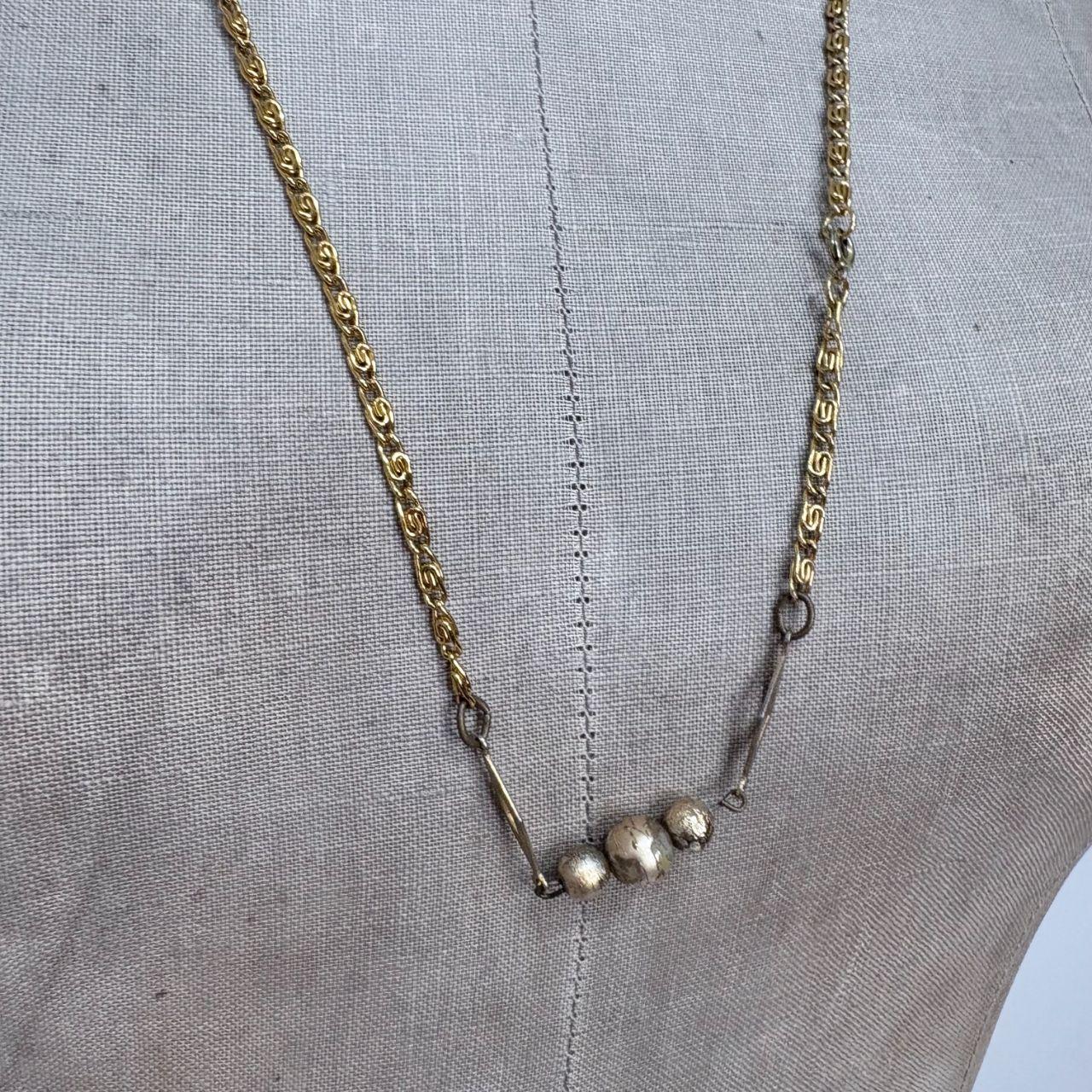 Long gold ball twist chain necklace