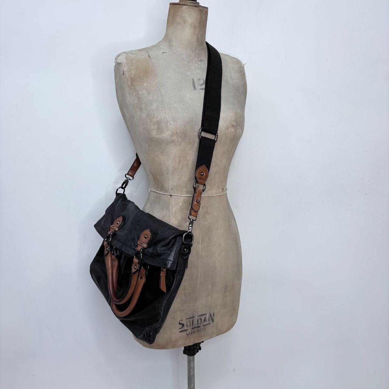 Black buckle leather bag