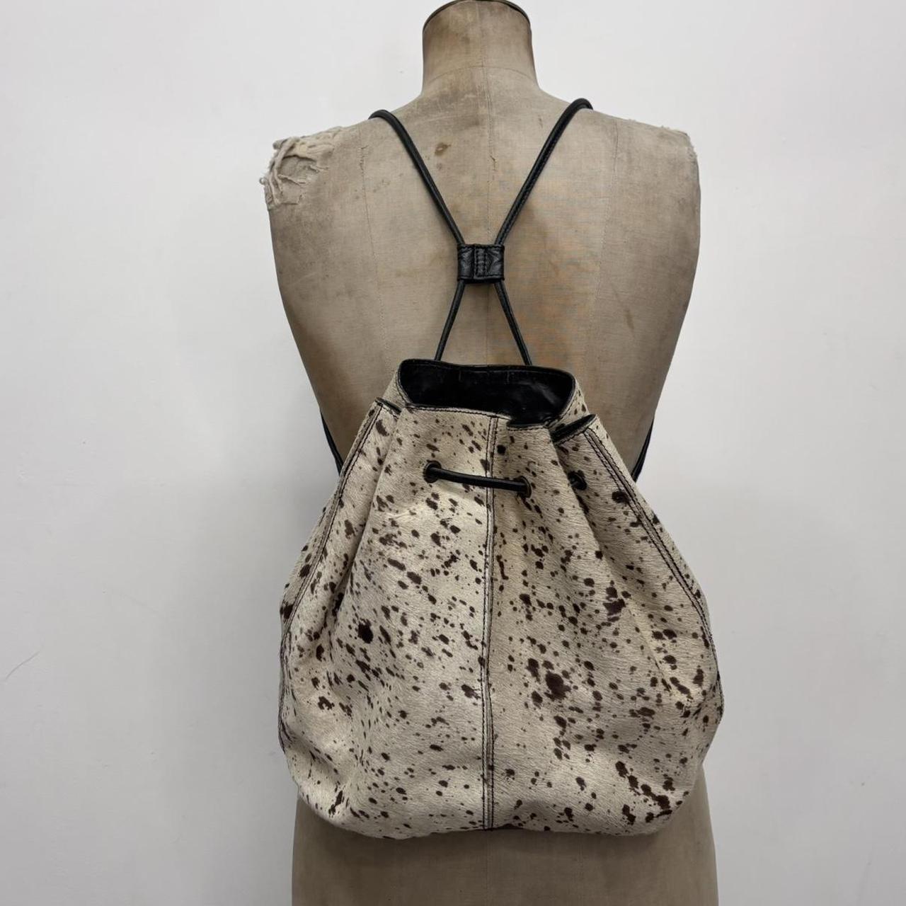 Drawstring cowhide leather backpack