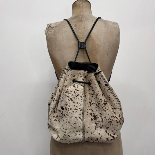 Drawstring cowhide leather backpack