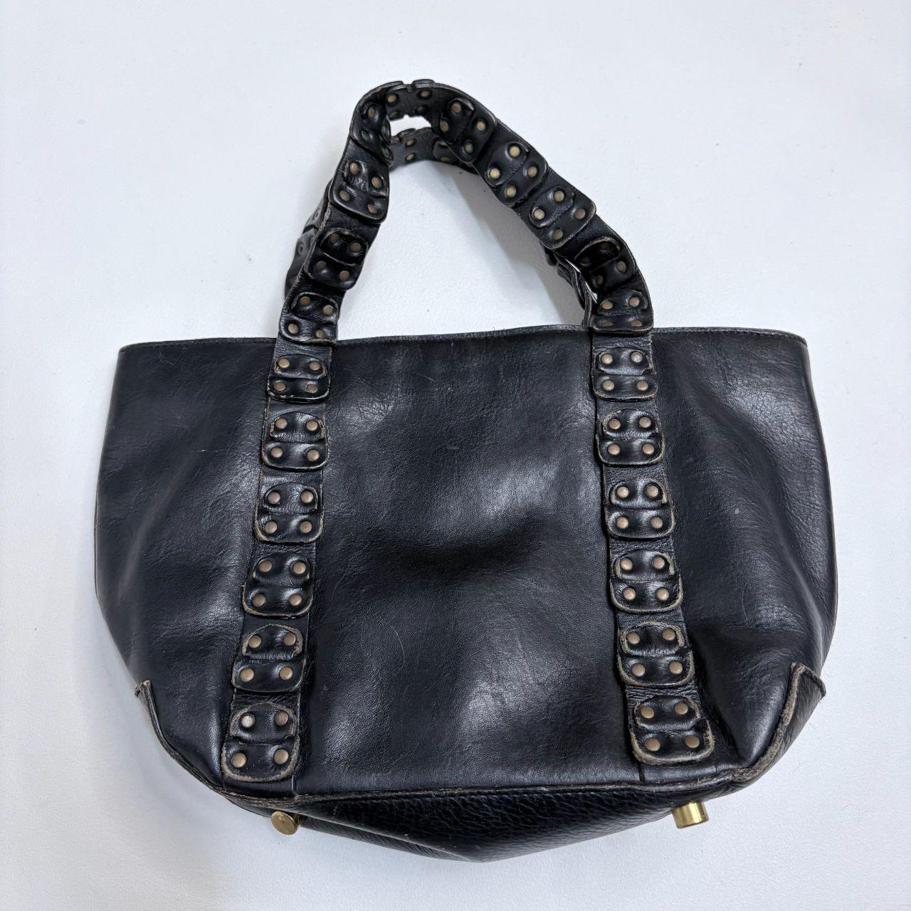 Black leather studded eyelet bag