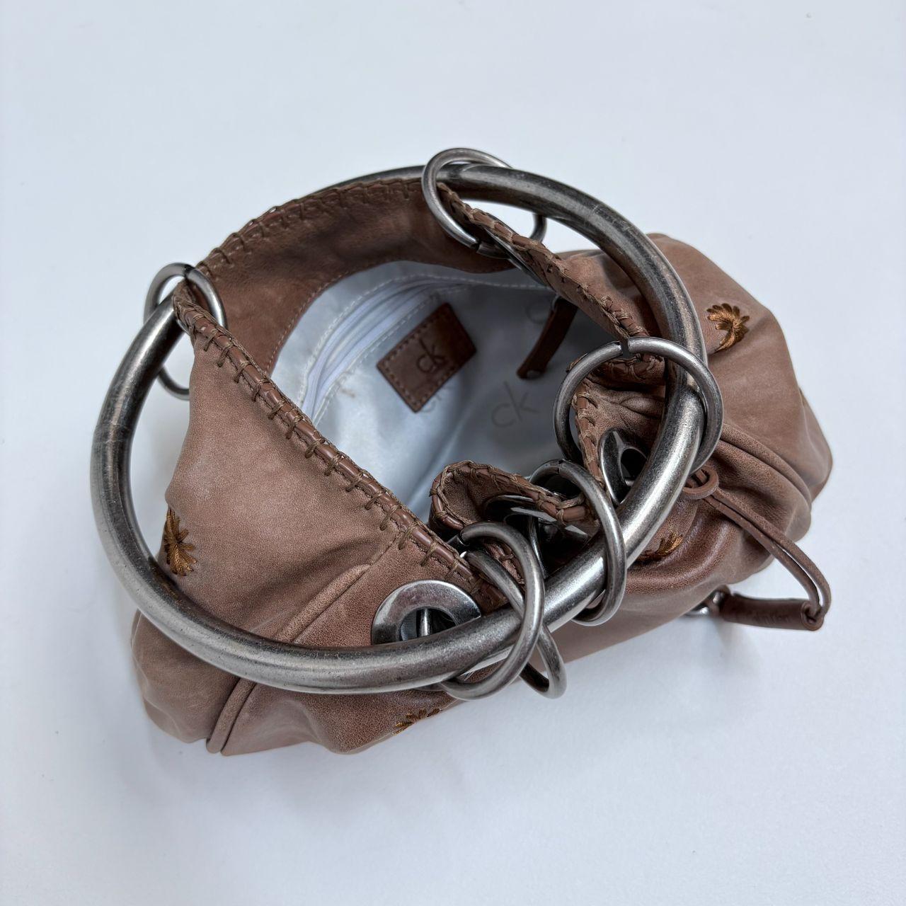 Tan leather metal circle bag