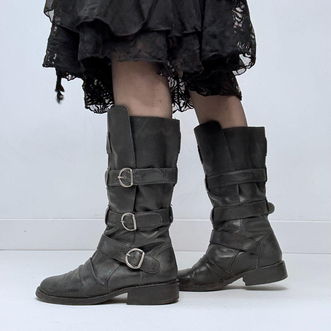 Black leather buckle boots