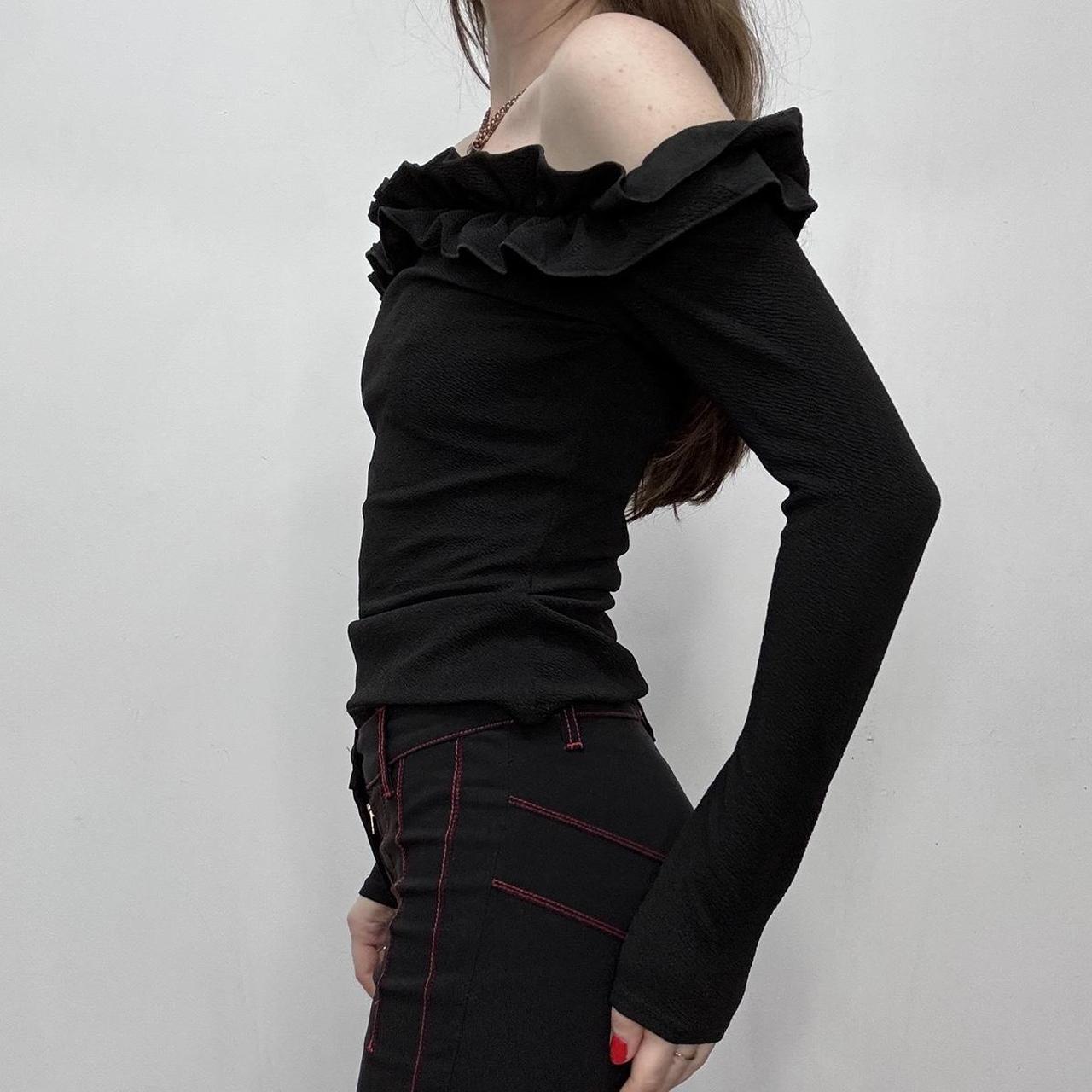 Black off the shoulder ruffle shirt
