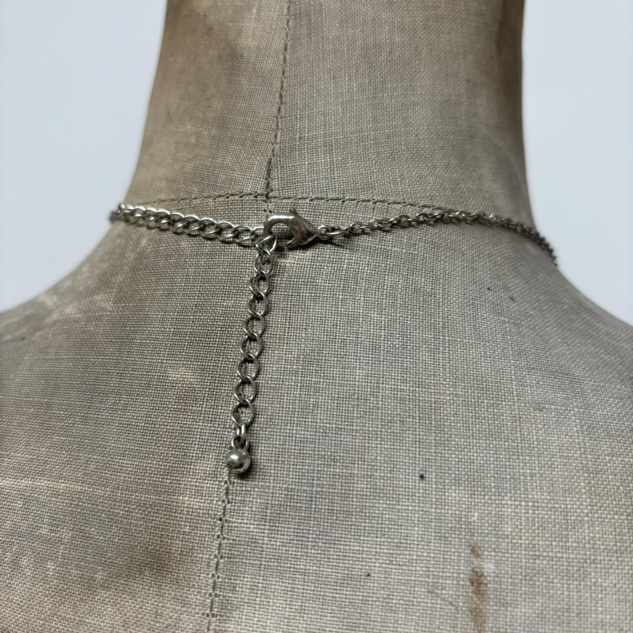 Silver bow necklace