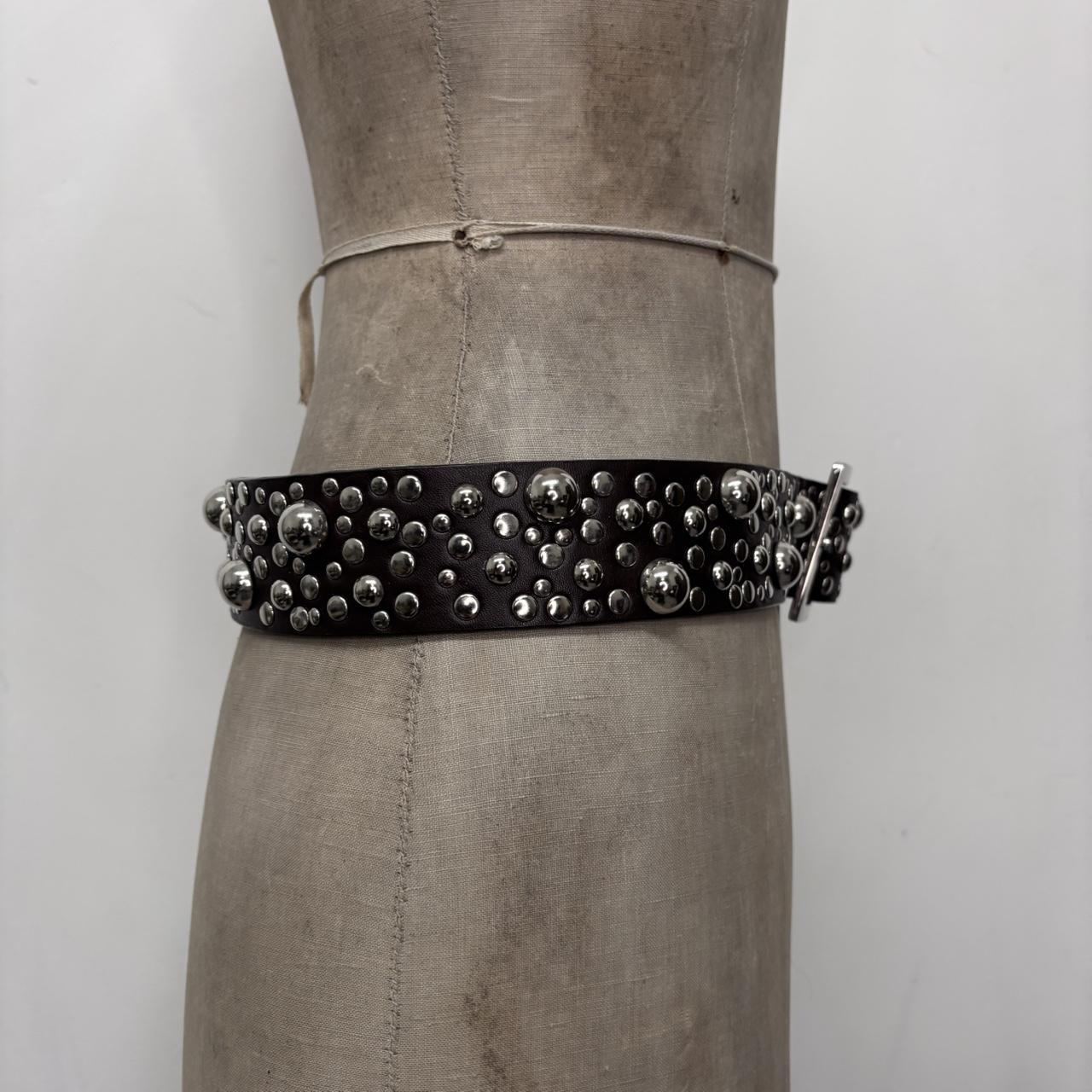 Studded silver eyelet belt