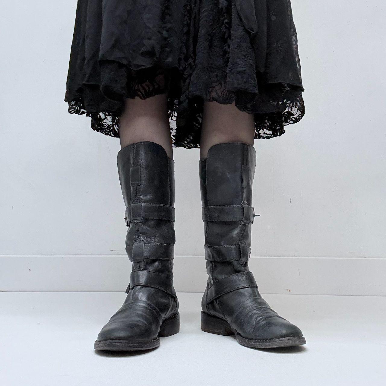 Black leather buckle boots