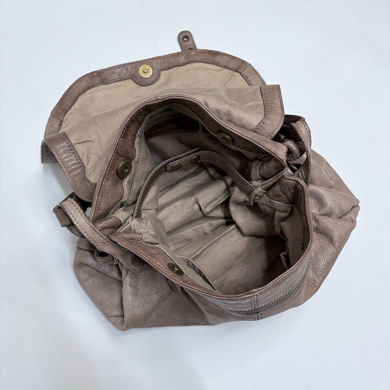 Tan leather slouchy buckle hobo bag