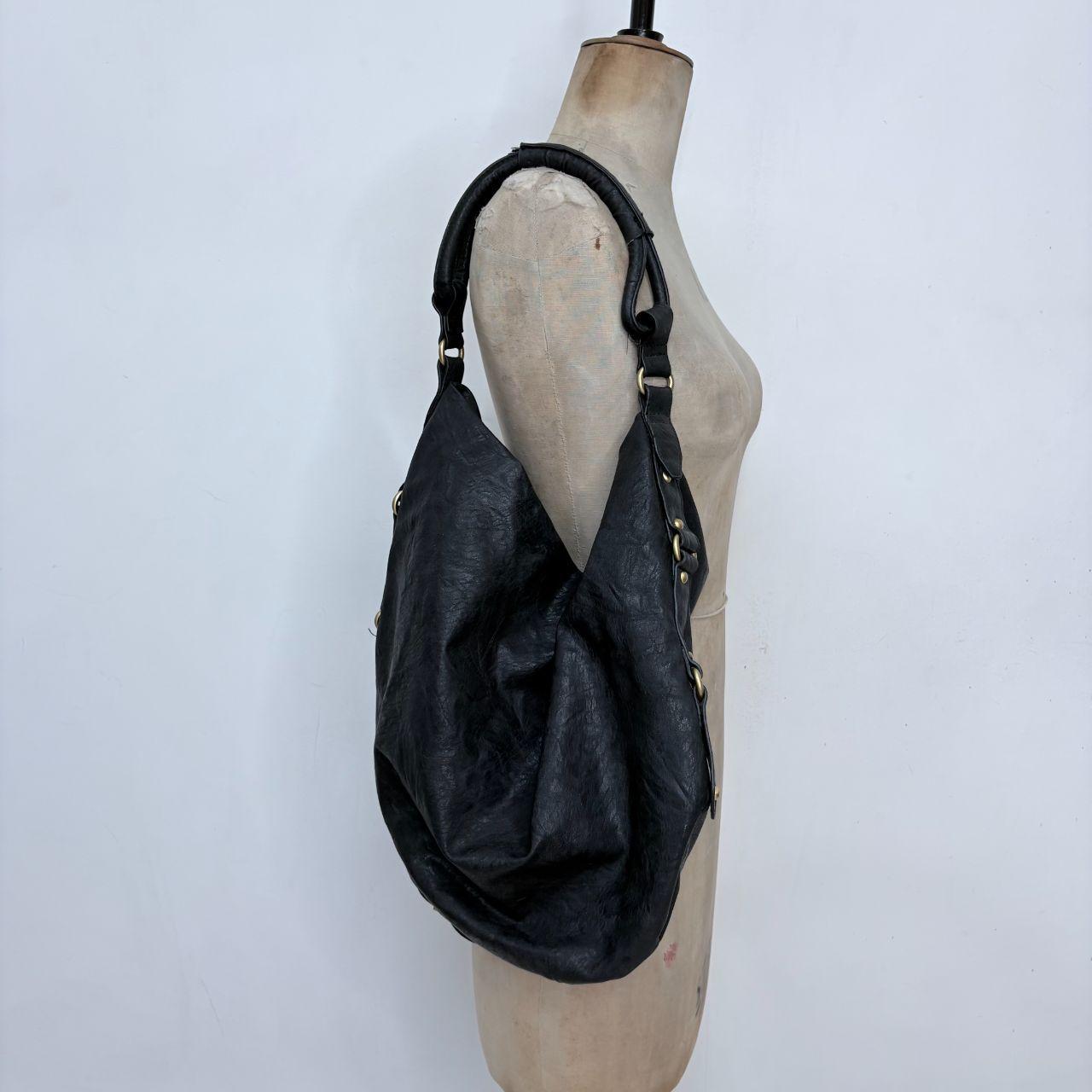 Black slouchy studded hobo bag
