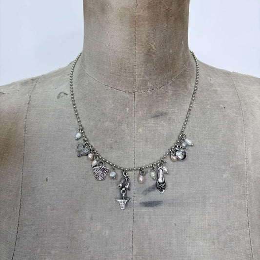 Silver charm pearl necklace