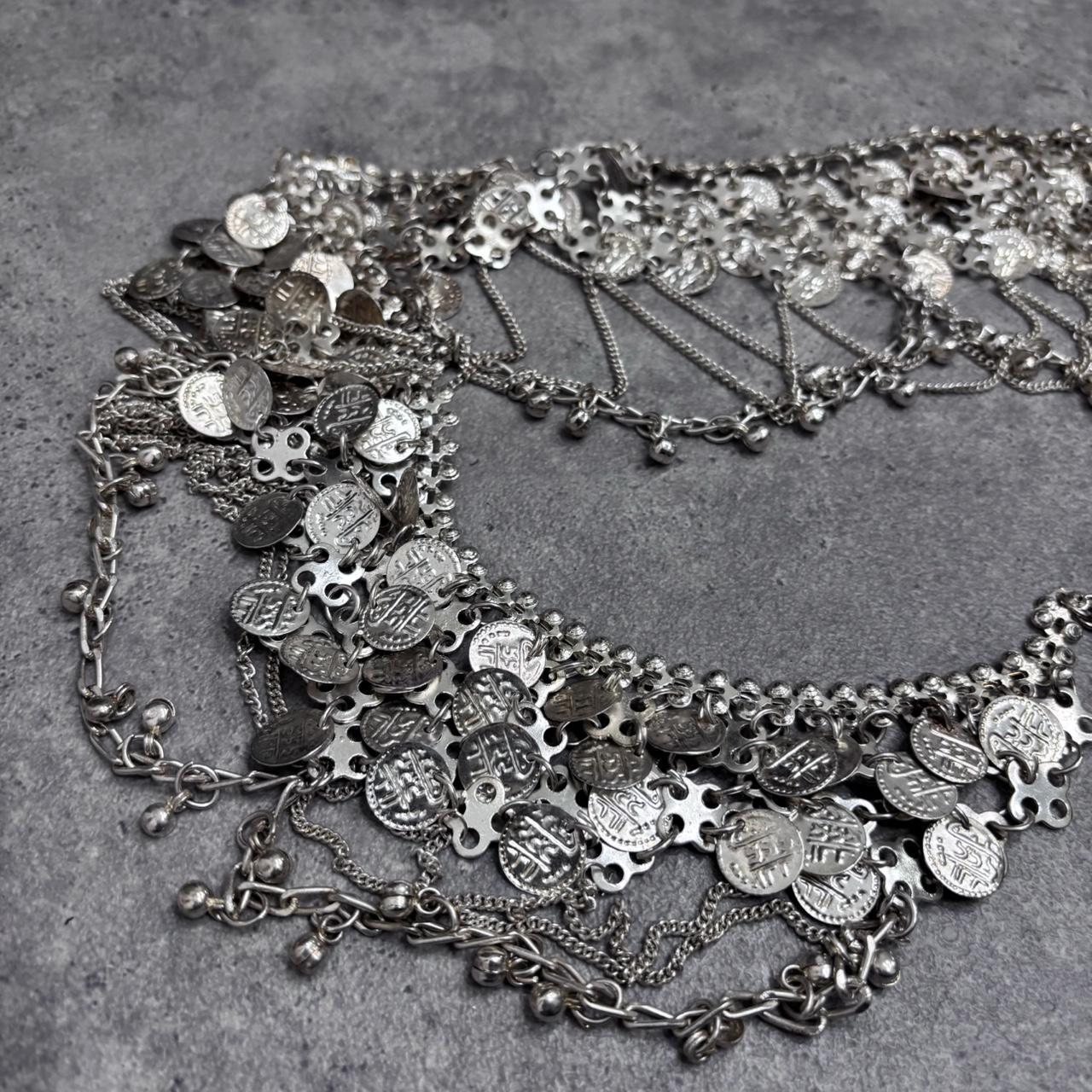 Silver coin draped chain belt