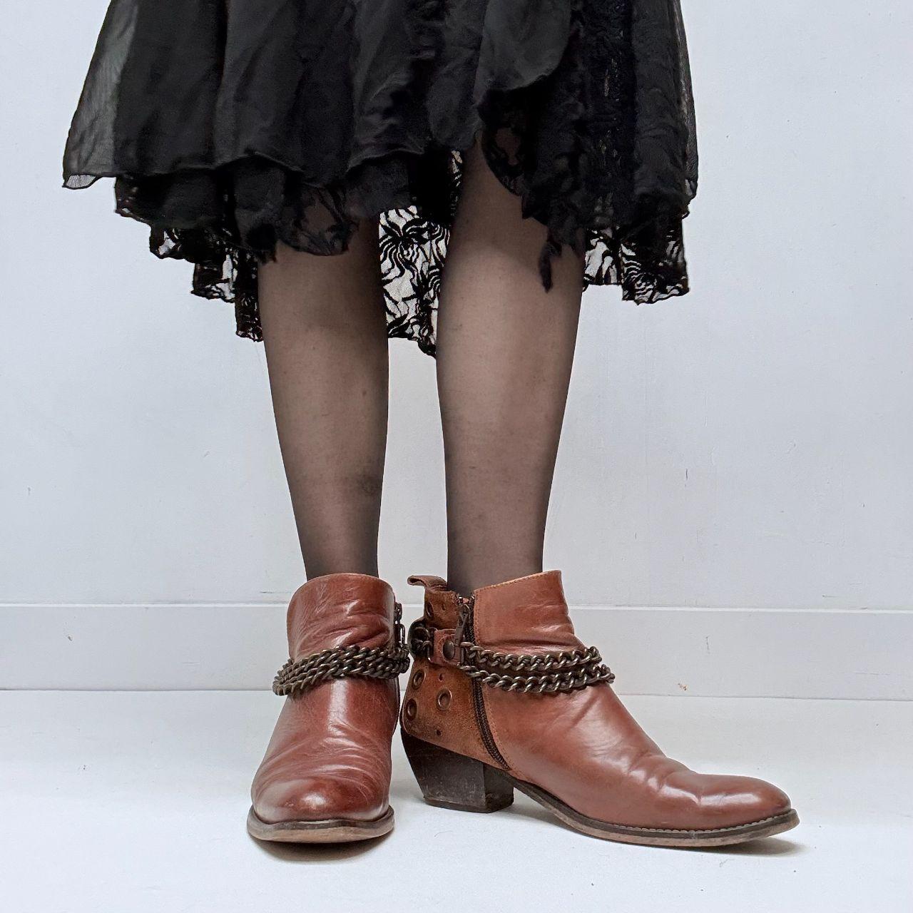 Brown leather studded buckle boots