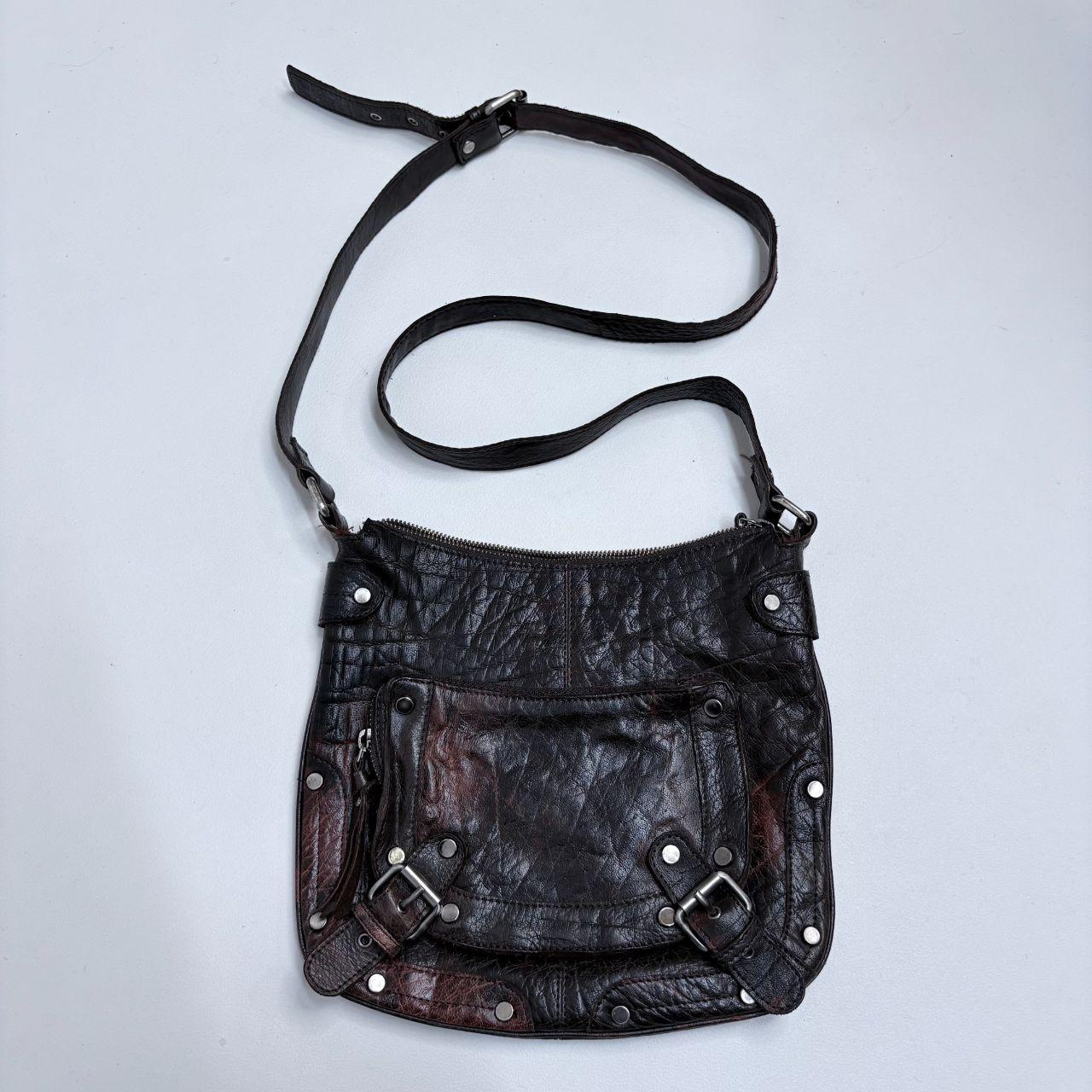 Distressed brown leather buckle studded bag