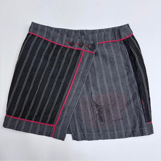 Asymmetric pinstripe cop copine mini skirt