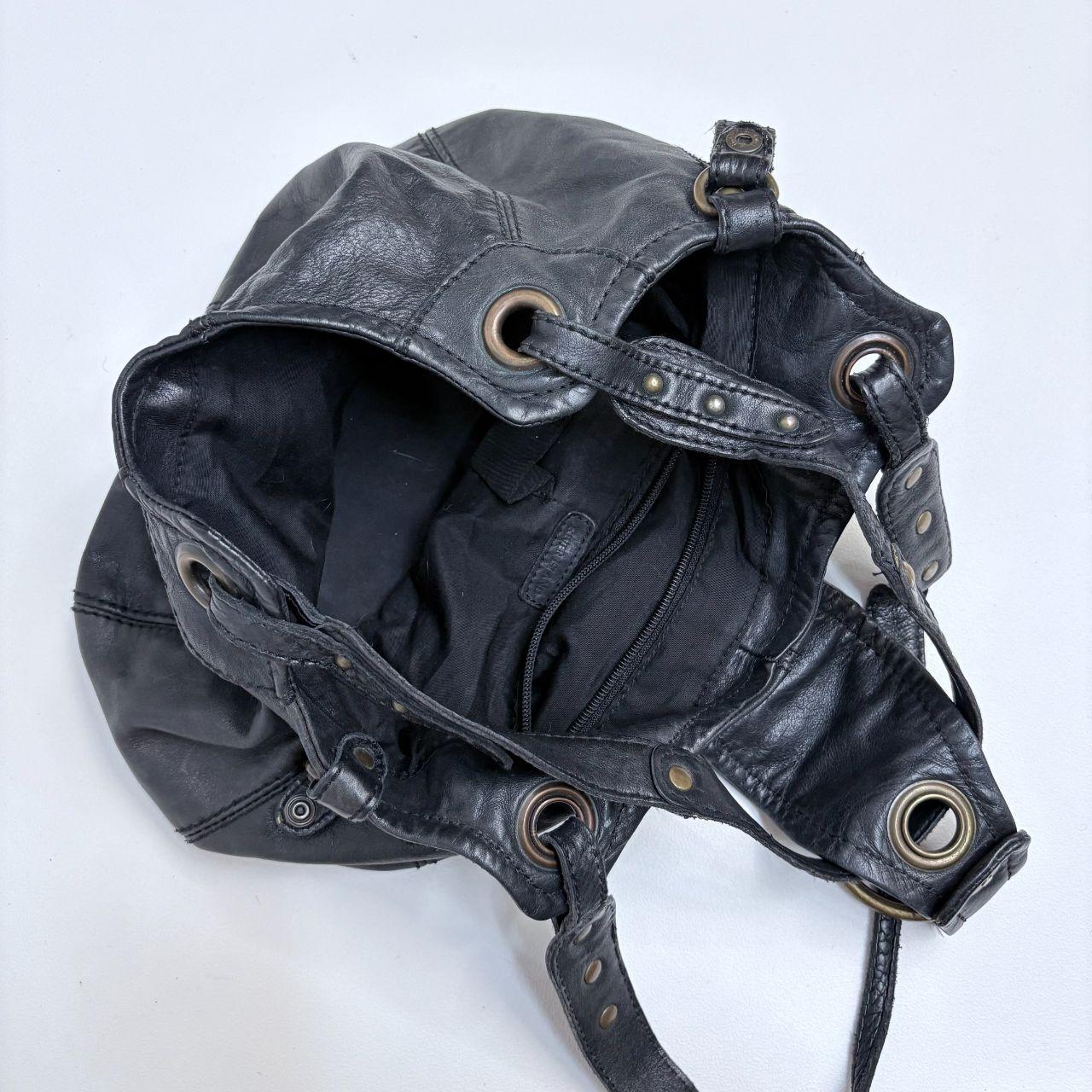 Black leather studded slouchy bag
