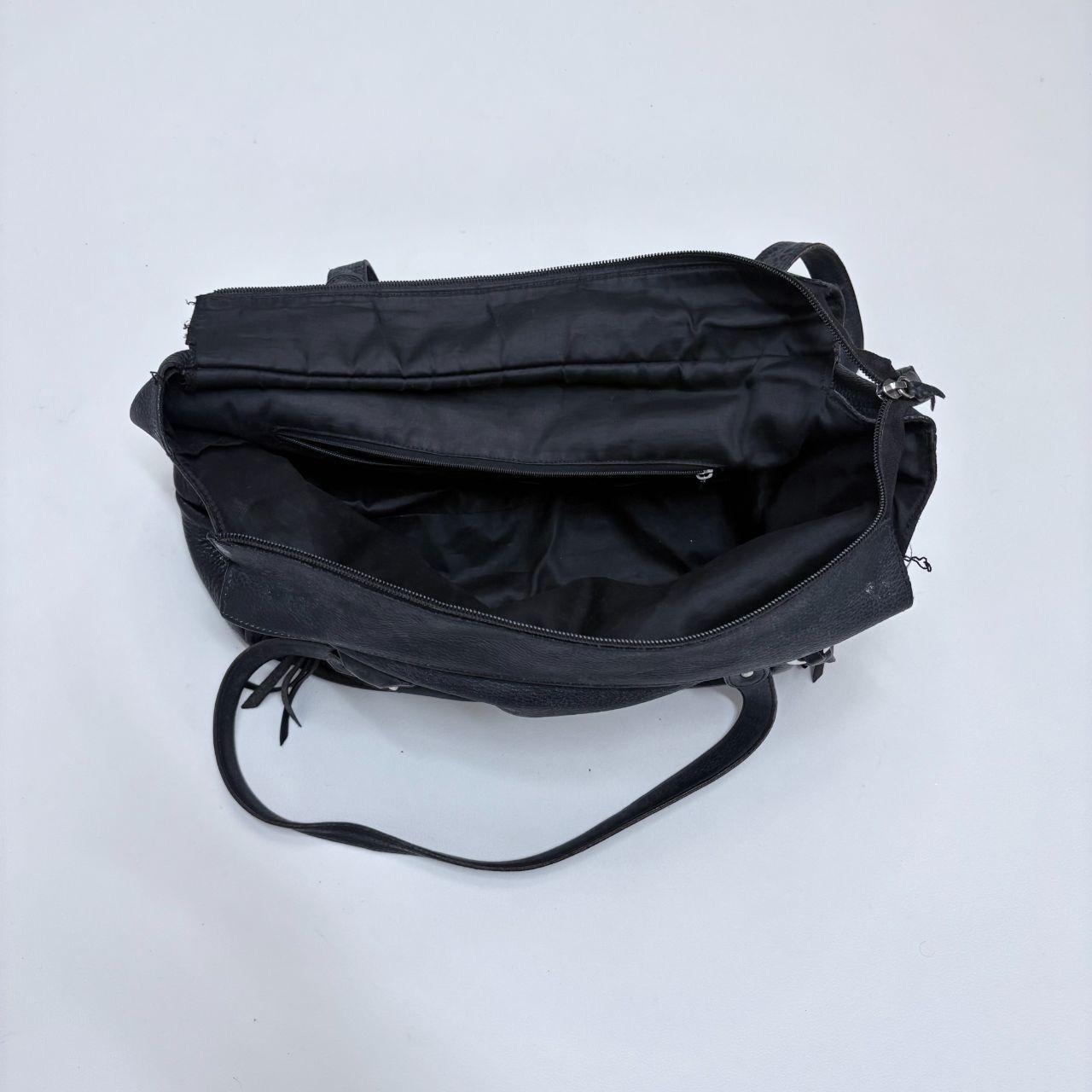Black leather slouchy tassel bag