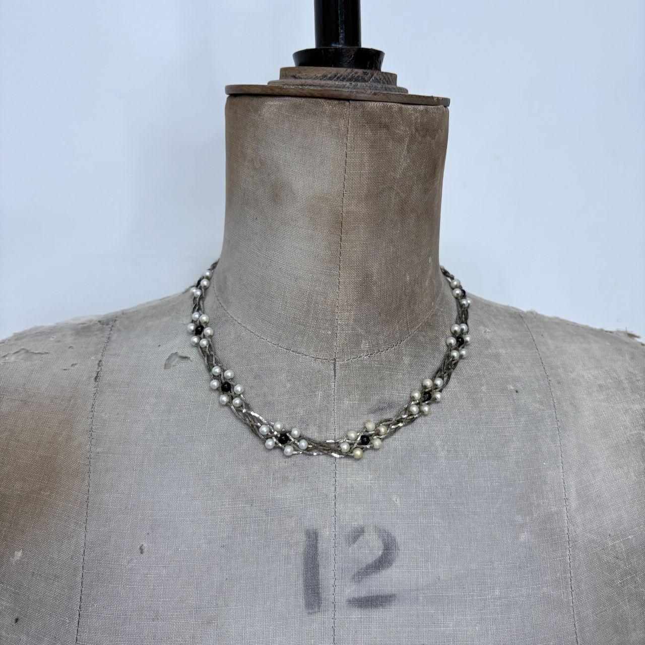 Silver woven pearl necklace