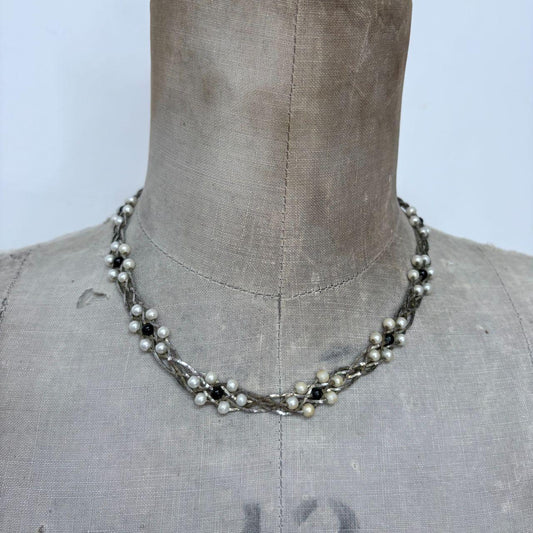 Silver woven pearl necklace