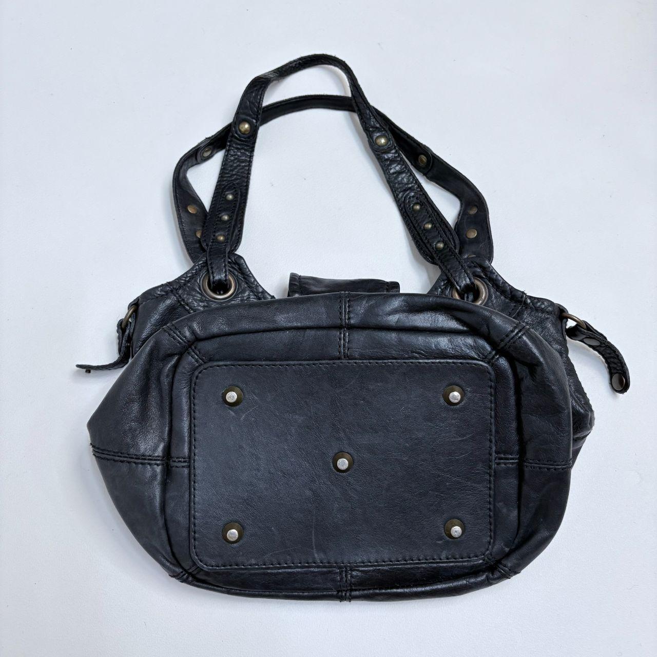 Black leather studded slouchy bag