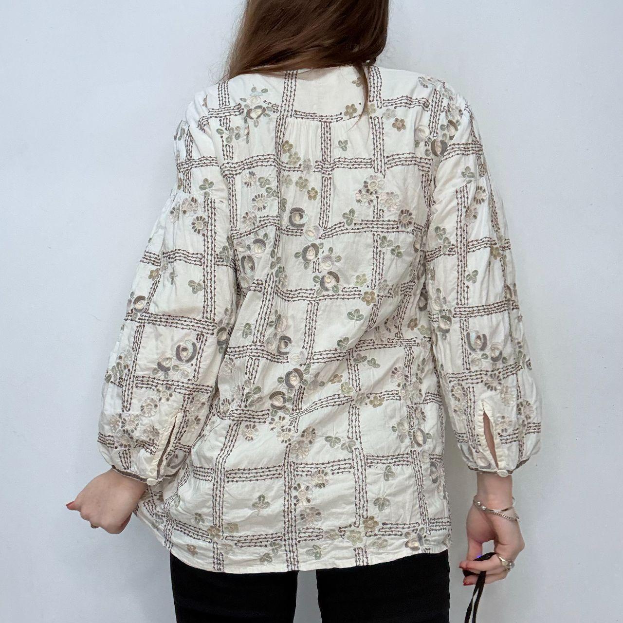White embroidered flared puff sleeve shirt