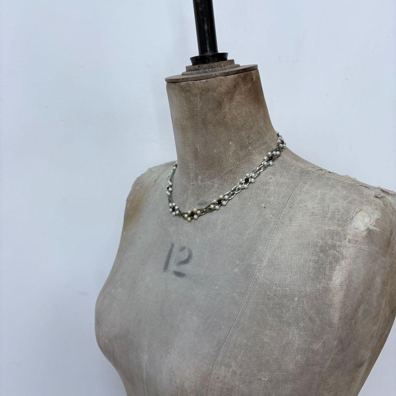 Silver woven pearl necklace