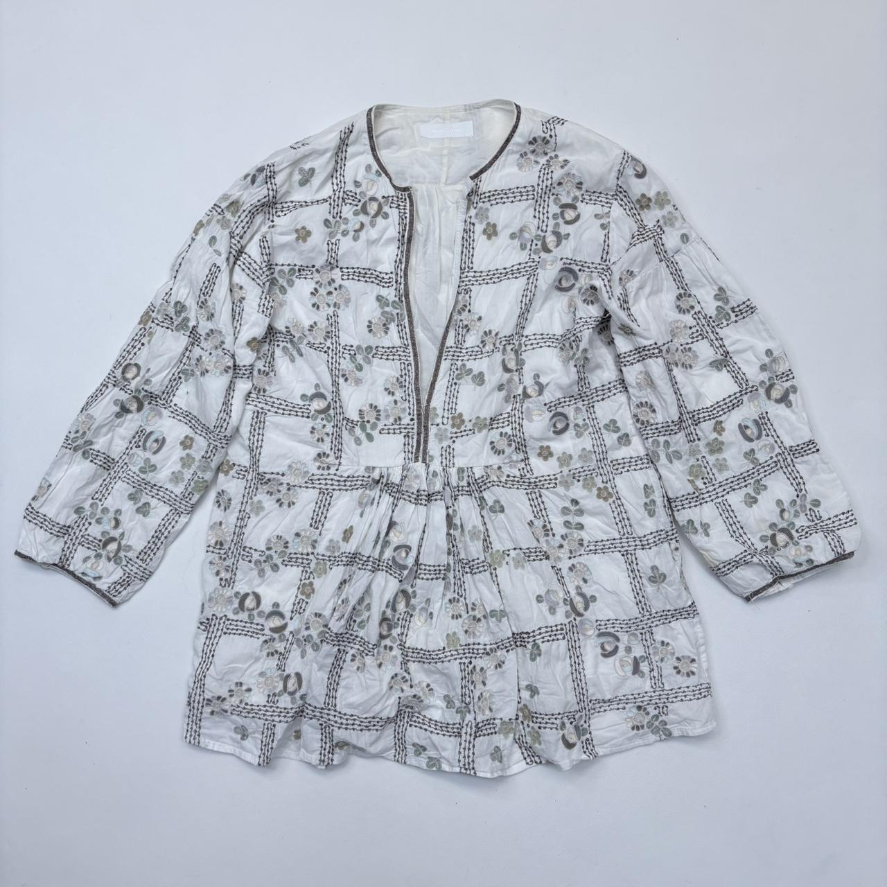 White embroidered flared puff sleeve shirt