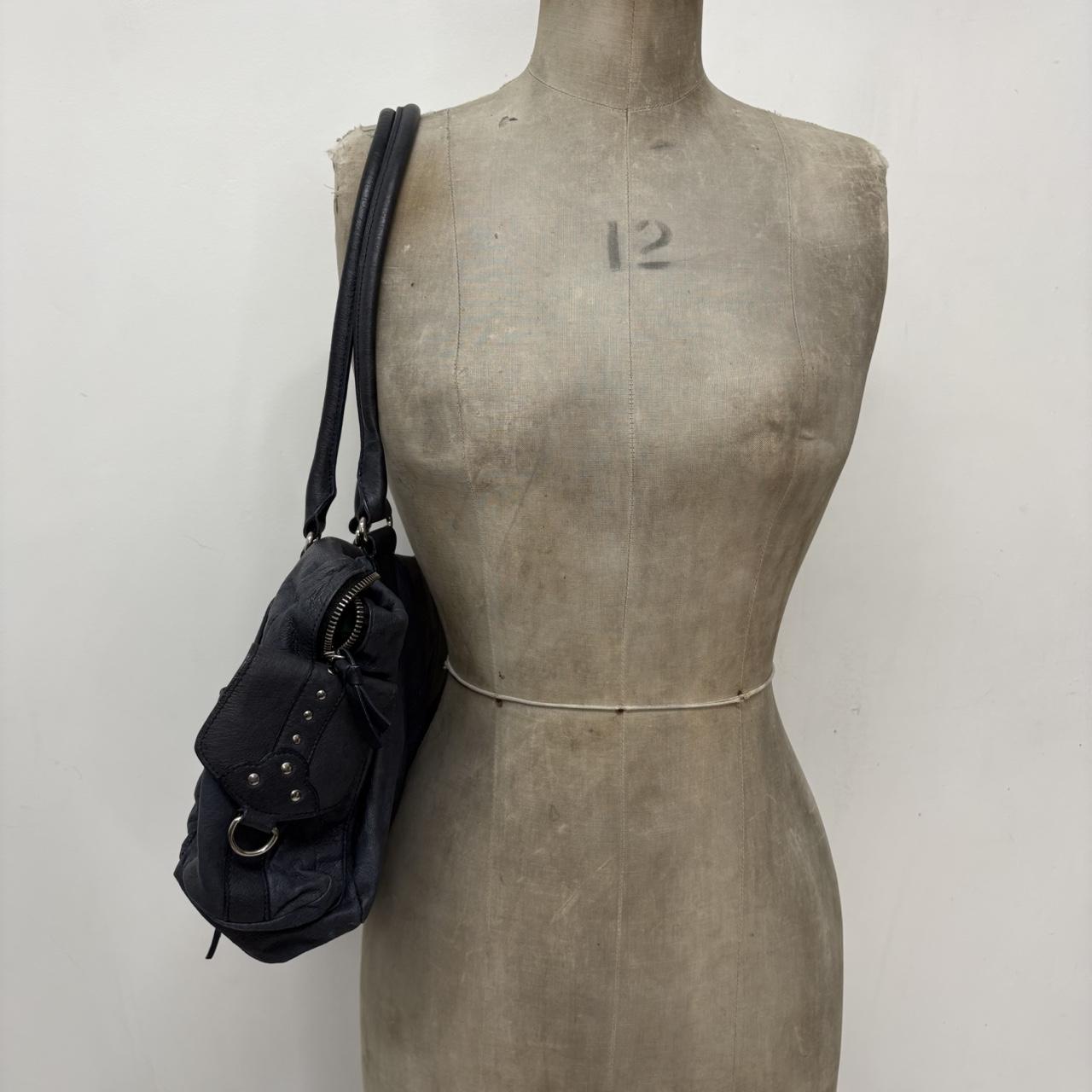 Blue leather studded city bag