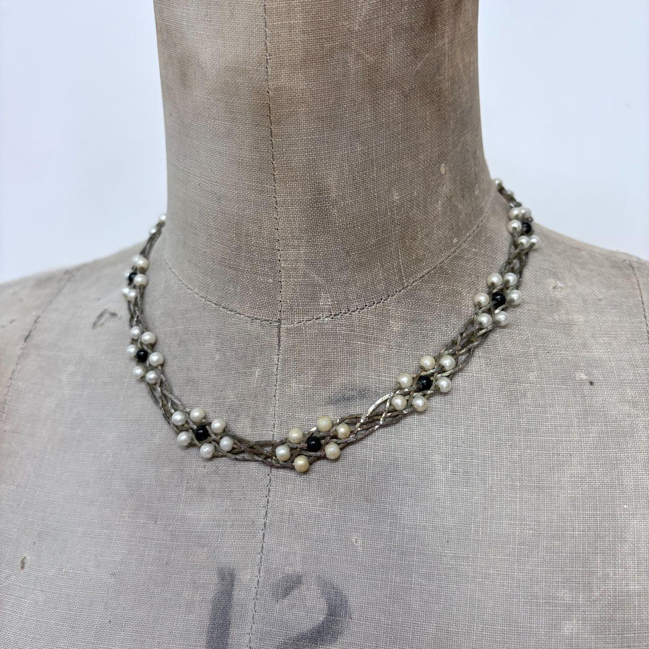 Silver woven pearl necklace