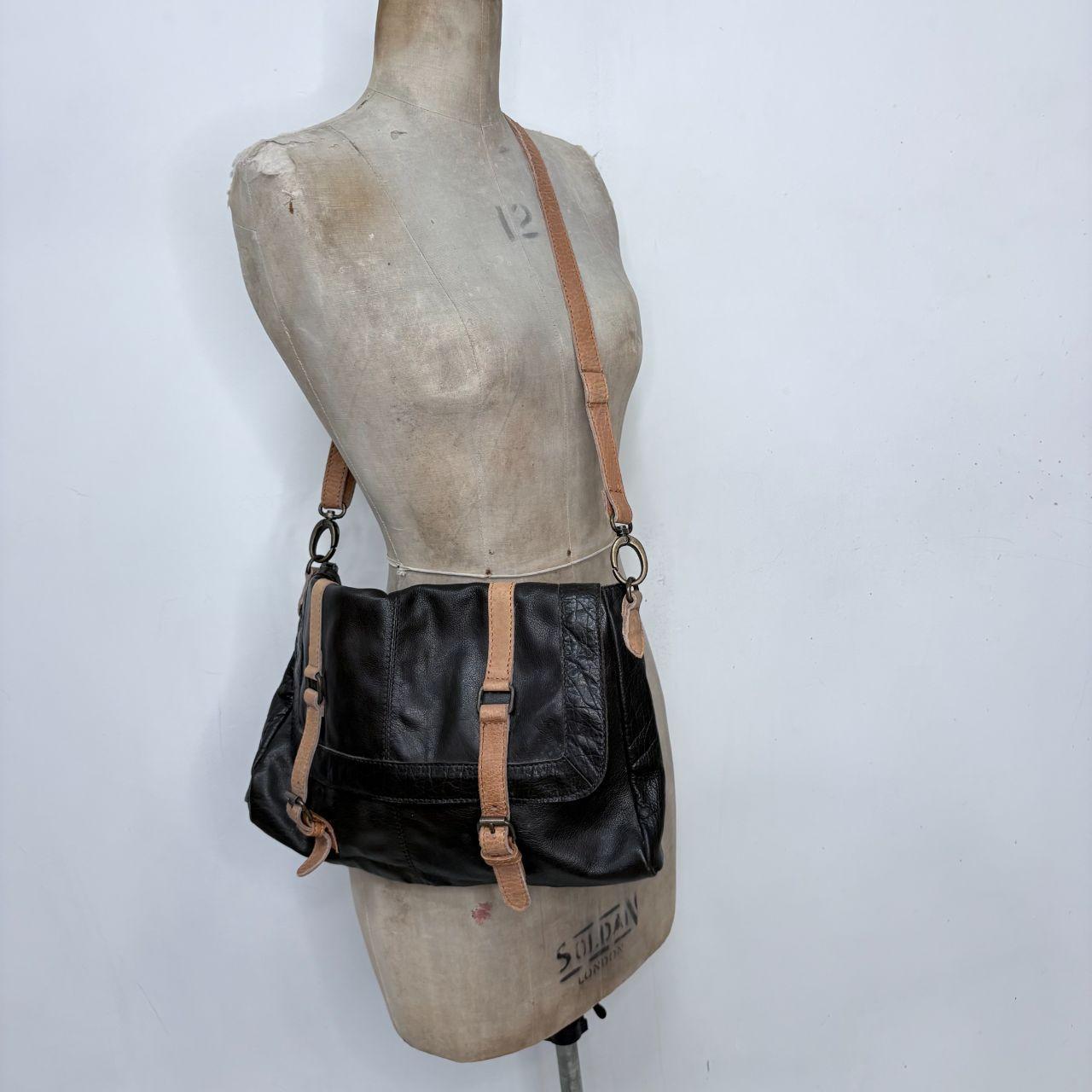 Black buckle leather bag