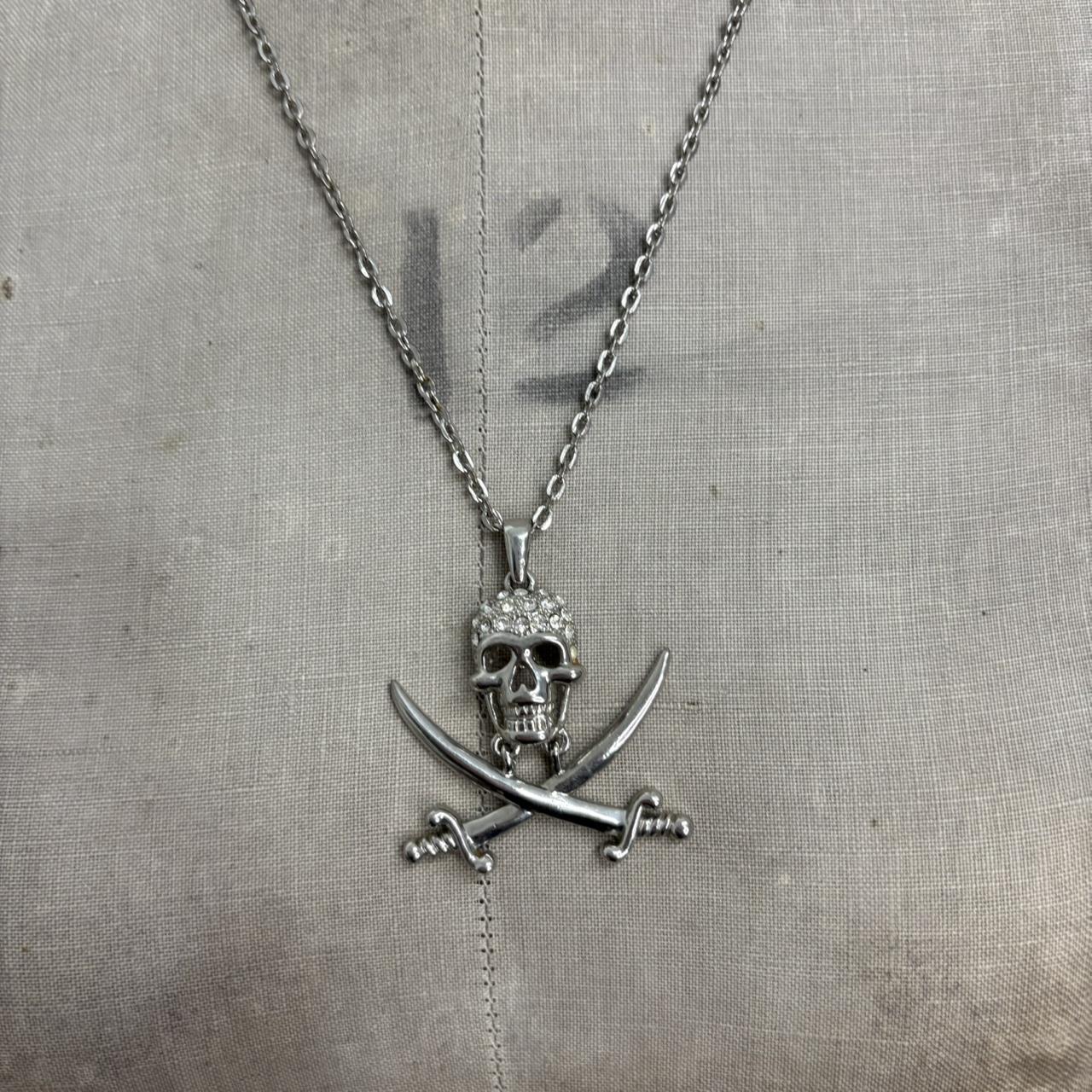 Silver skull and cross bone necklace