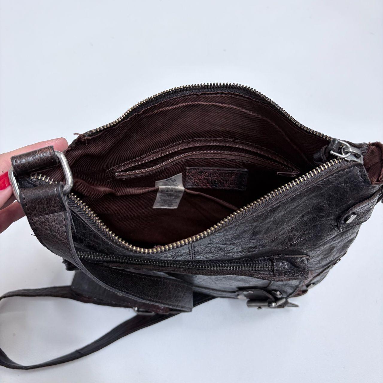 Distressed brown leather buckle studded bag