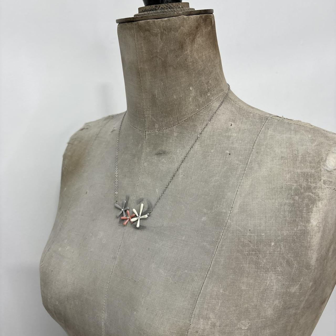 Silver flower pendant