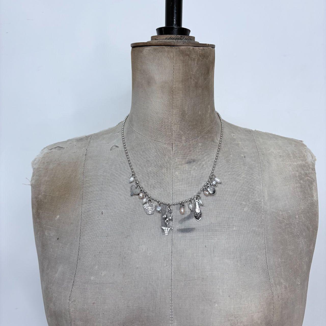 Silver charm pearl necklace