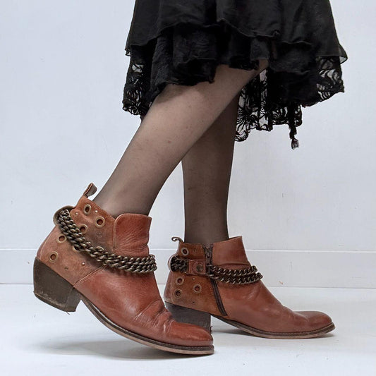 Brown leather studded buckle boots