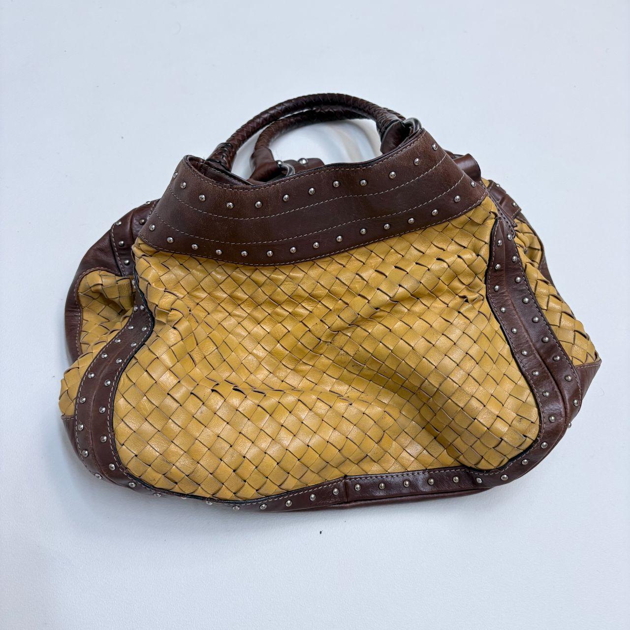 Woven leather studded slouchy shoulder bag